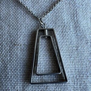 Geometric silver pendant with 26’ silver chain